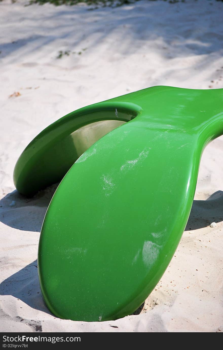 Green chair style on beach