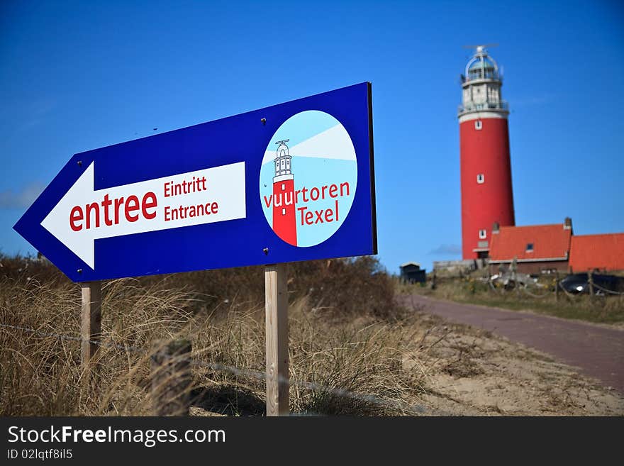 Lighthouse In The Dunes At The Beach