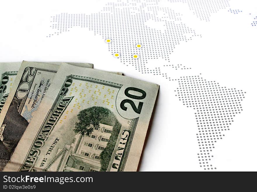 US dollars with background of a map. US dollars with background of a map