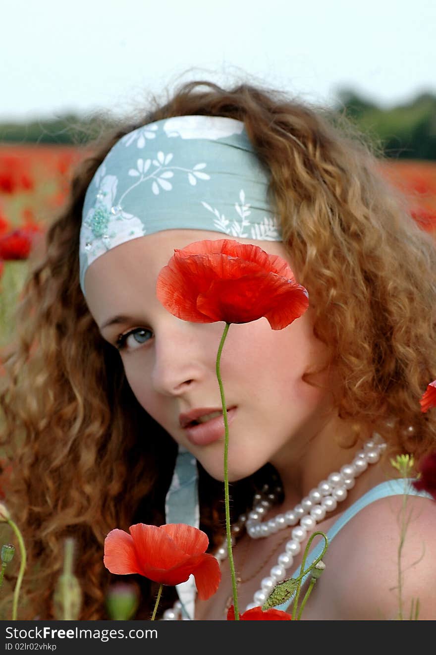 Girl with a poppy near Dnepropetrovsk 2010