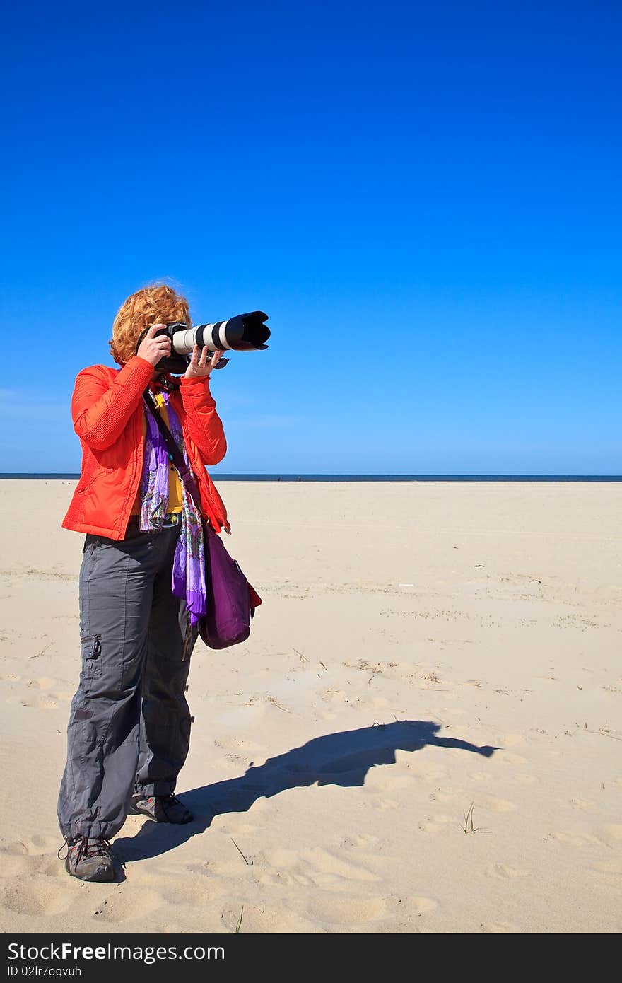 Women photographer on the beach