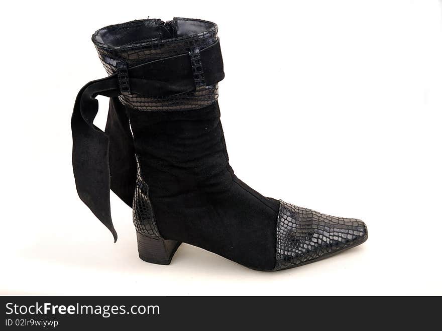 Black shine woman boot isolated over white