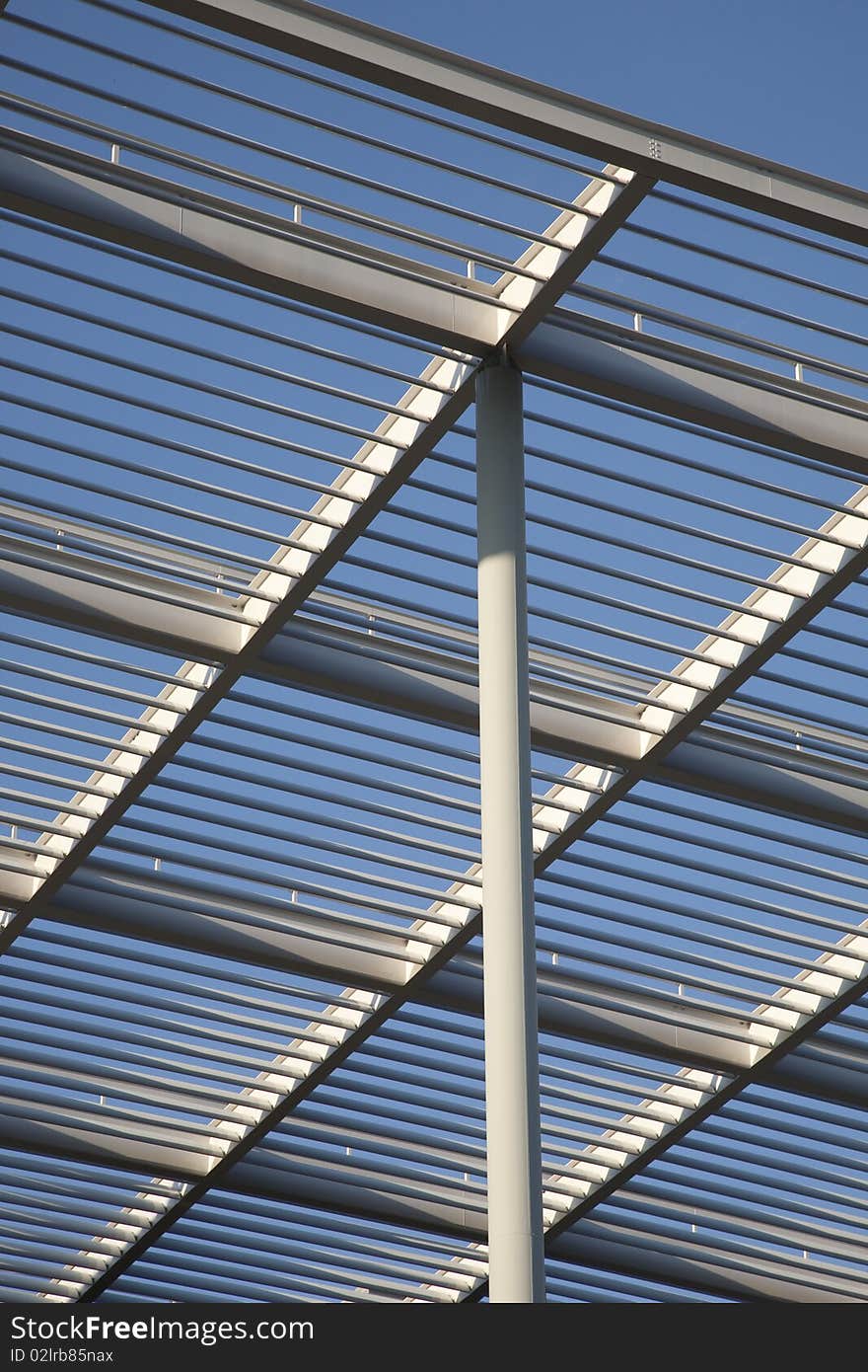 Modern roof architecture detail against clear blue sky. Modern roof architecture detail against clear blue sky