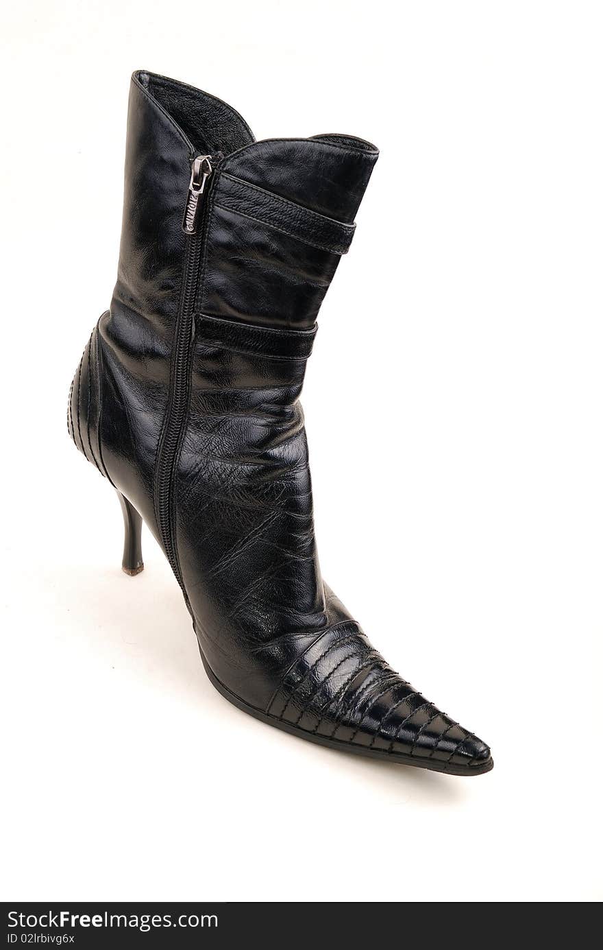 Black shine woman boot isolated over white