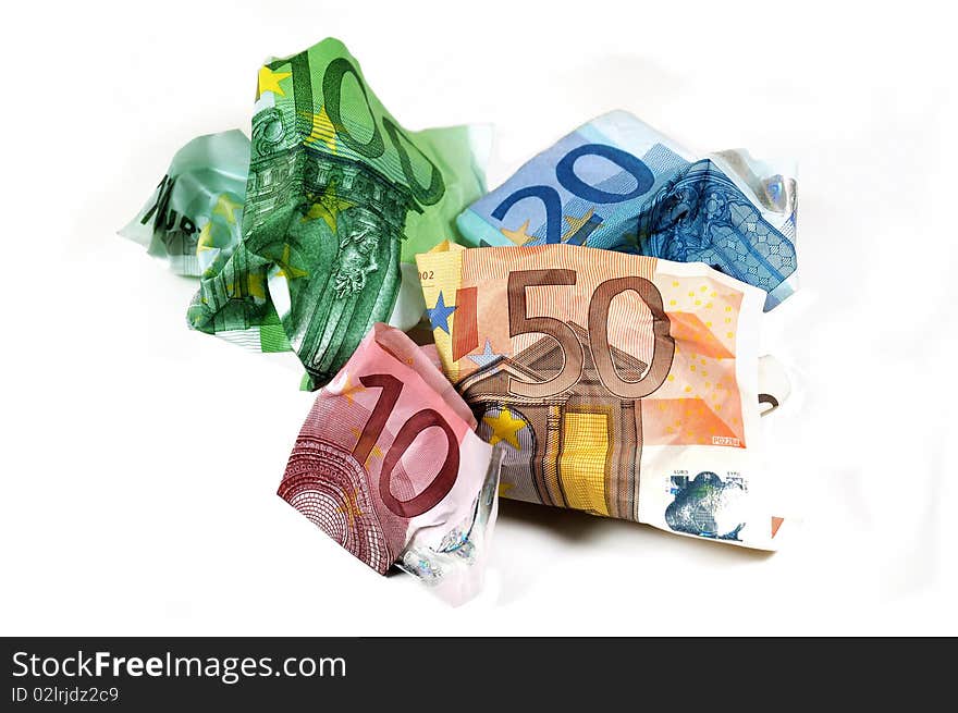 Wrinkled banknotes from 10 to 100 Euro on white background. Wrinkled banknotes from 10 to 100 Euro on white background