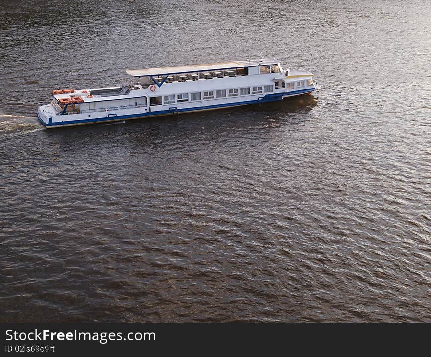 Pleasure boat on a river. Pleasure boat on a river