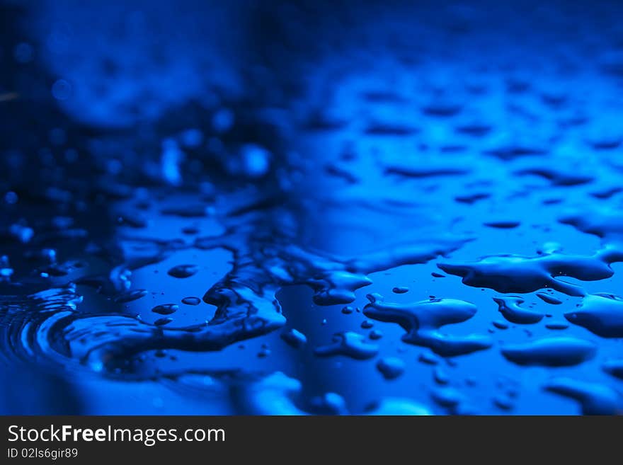 Abstract drops on surface in blue colors. Abstract drops on surface in blue colors