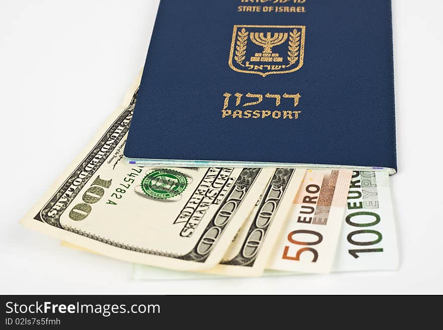 Israeli passport and dollar bills isolated on white with cliping path