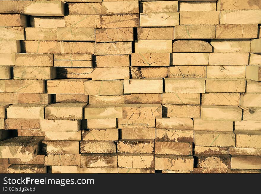 Pile of wood. Planking for floor.