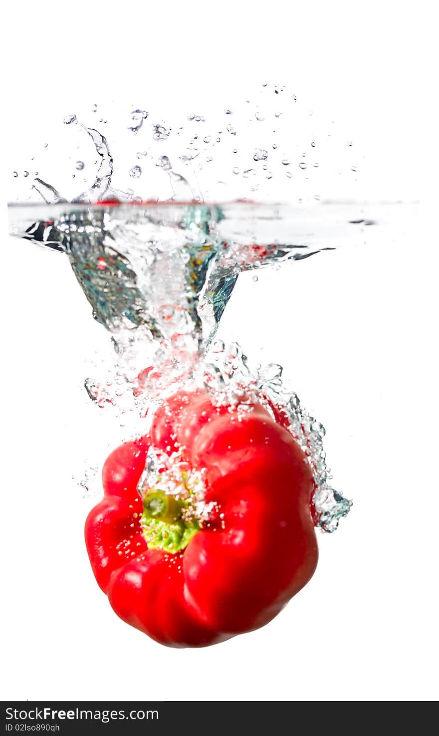 Water splash on red pepper isolated on white. Water splash on red pepper isolated on white