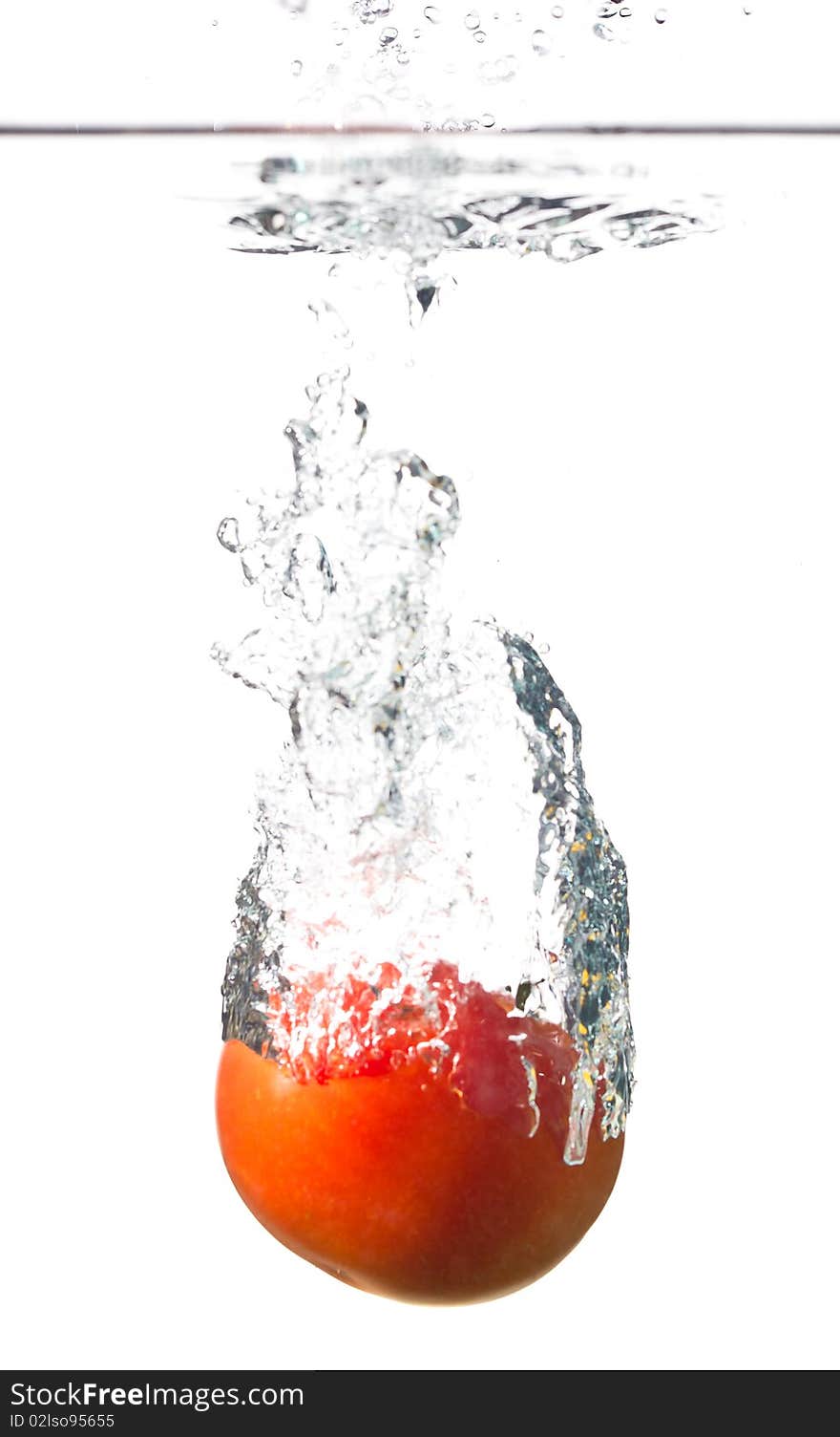 Water splashing from a tomato. Water splashing from a tomato