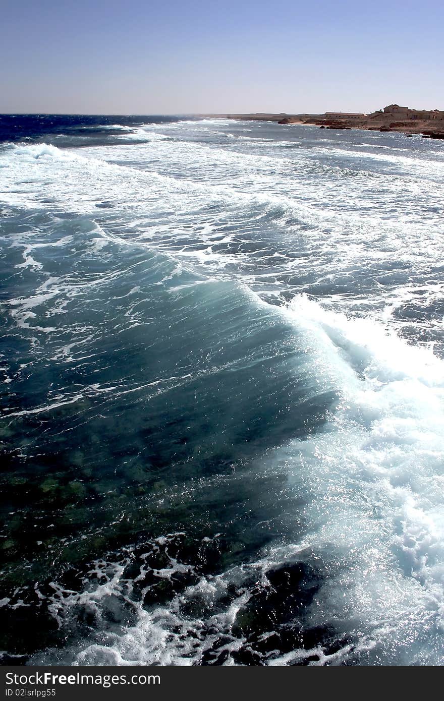 Turquoise transparent wave of the Red sea in Egypt