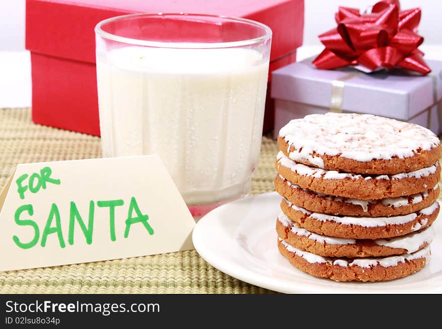 Cookies and milk on table for Santa. Cookies and milk on table for Santa