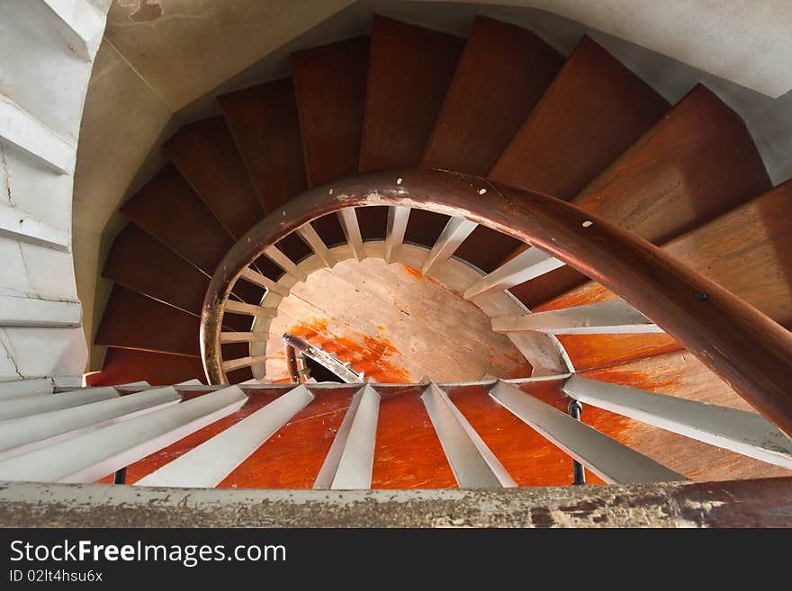 A wood spiral staircase image