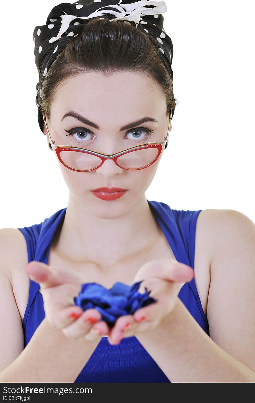 Pretty young woman with red eyeglassess hold blue flower petals ins hands isolated on white. Pretty young woman with red eyeglassess hold blue flower petals ins hands isolated on white