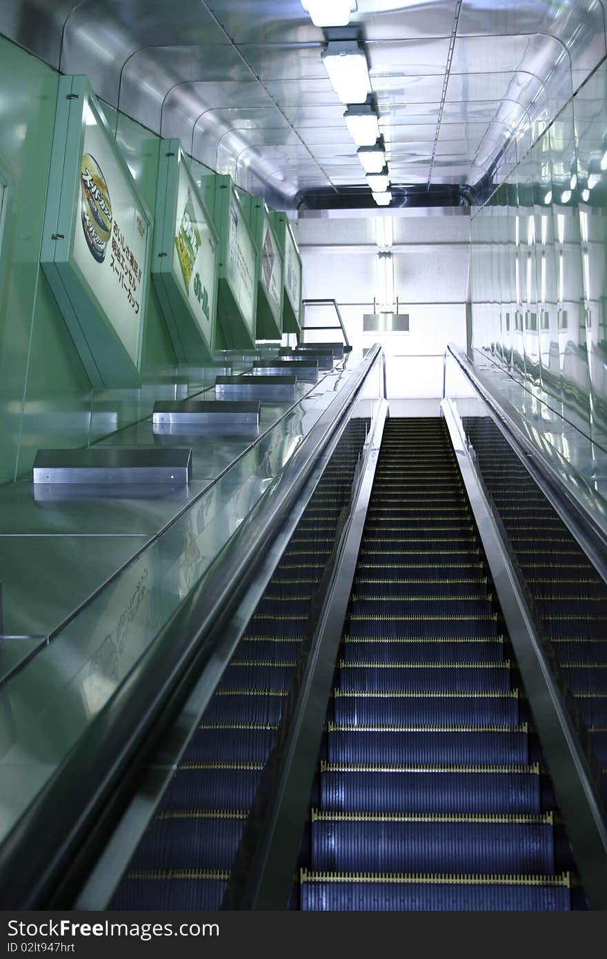 An Escalator going up,  in Japan. An Escalator going up,  in Japan