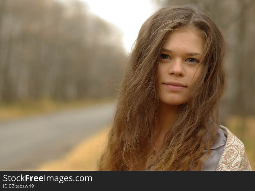 A portrait of a girl on a road