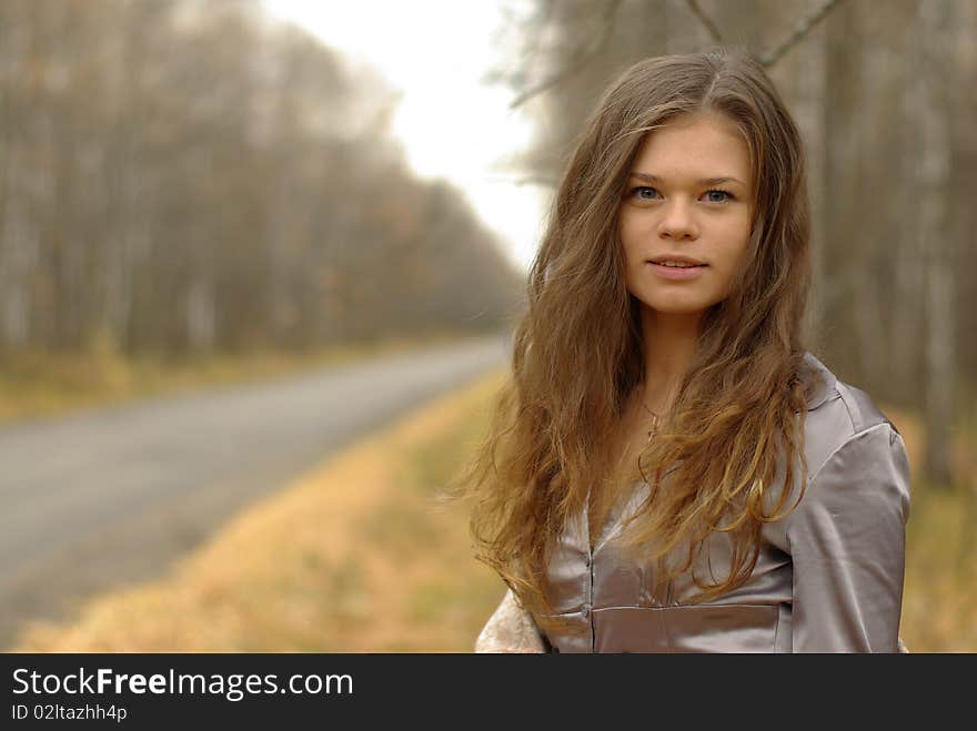 A portrait of a girl on a road