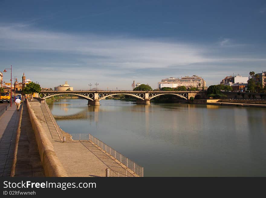 The bridge over the Guadalquivir river in Seville, Spain. The bridge over the Guadalquivir river in Seville, Spain