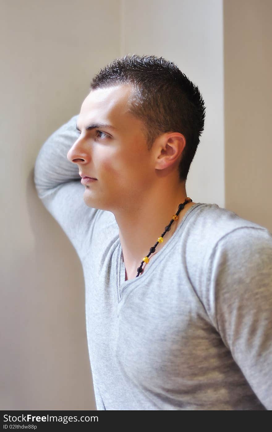 Beautiful young man posing in studio