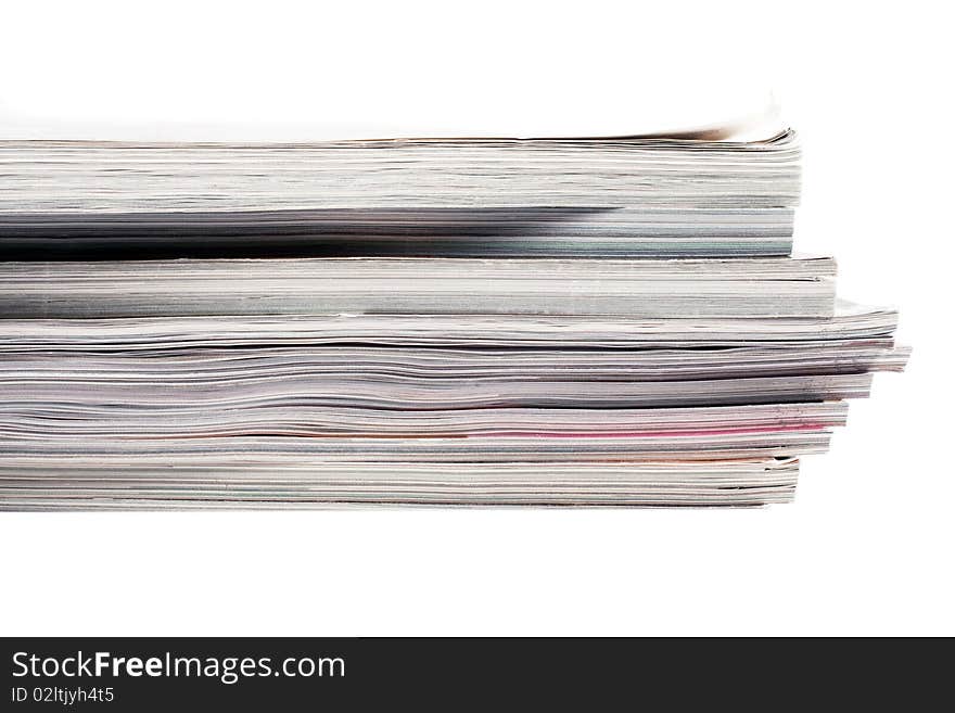 Stack of magazines isolated on a white