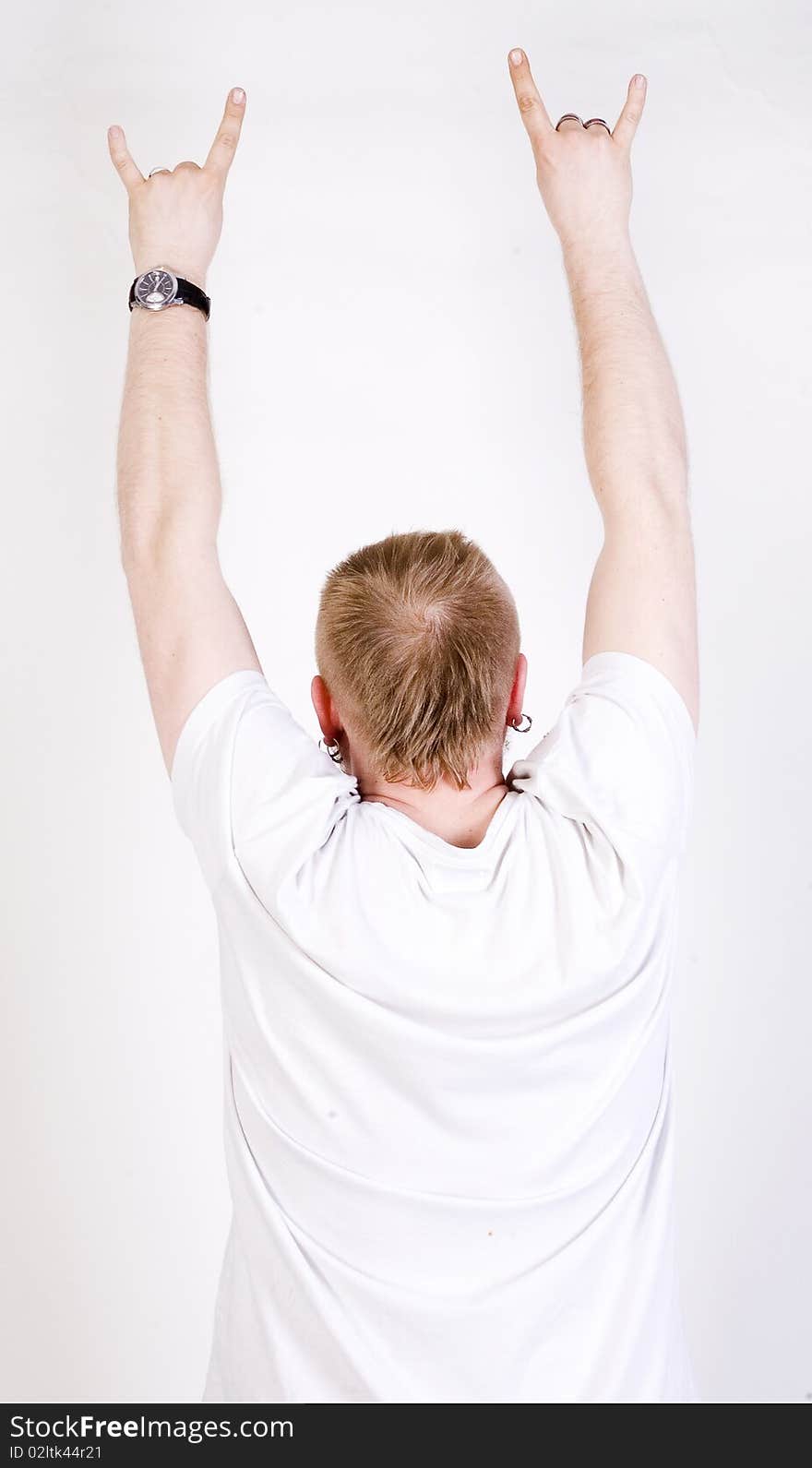 Man with raised hands isolated on a white