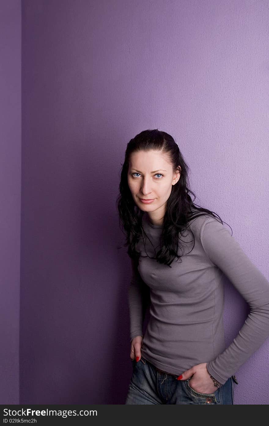 Lonely Woman Grieves On Purple Background