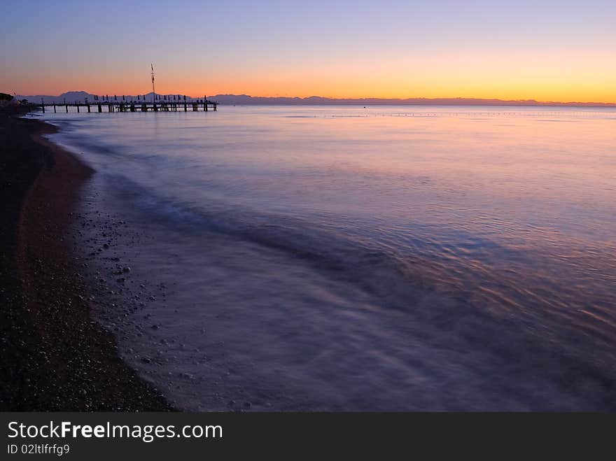 Romantic and colorful sunset on the beach