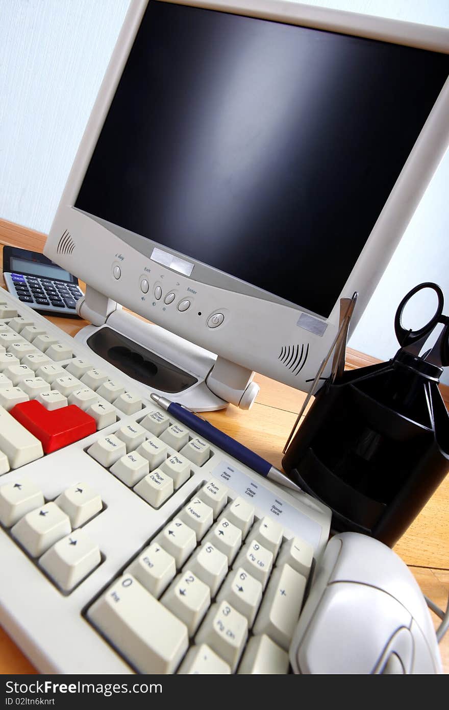 Keyboard And Monitor At Table