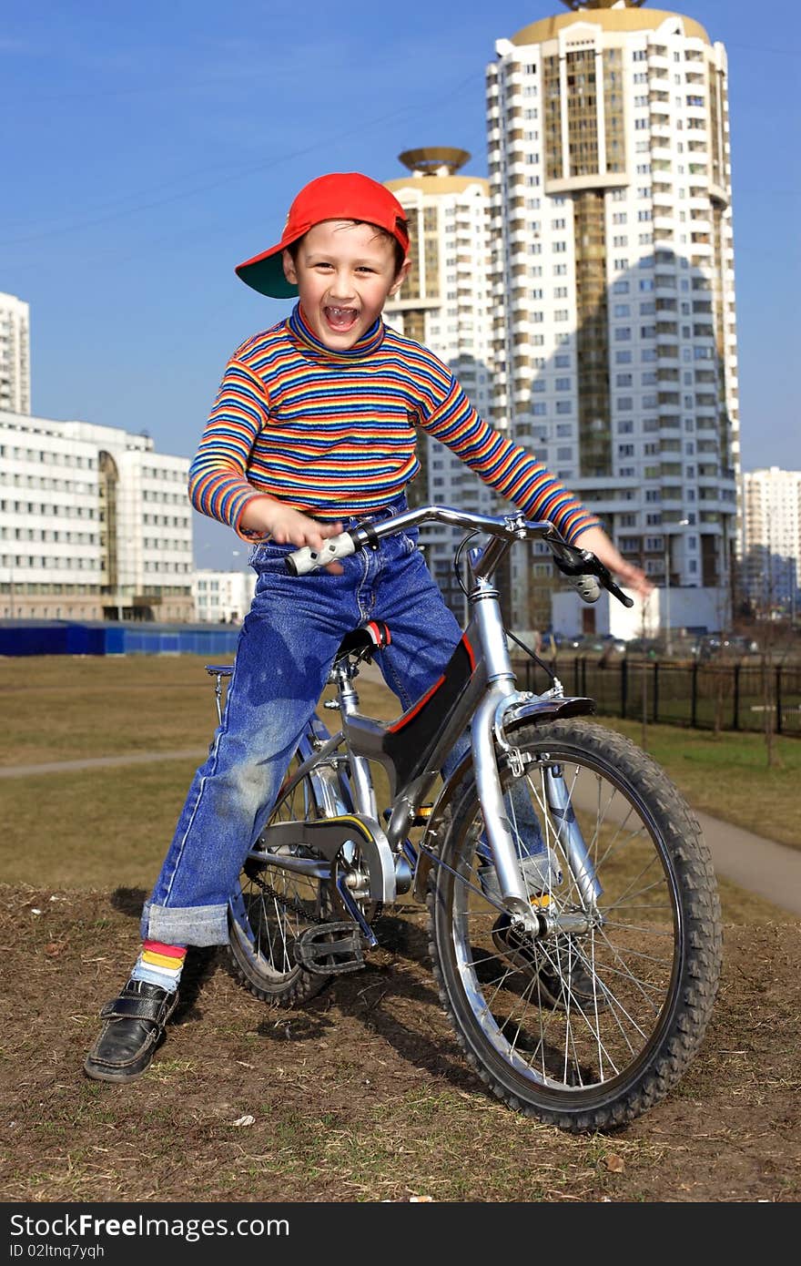 Boy Riding in Bicycle outdoors