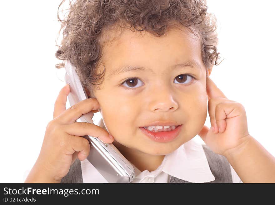 Shot of an adorable little boy on cellphone