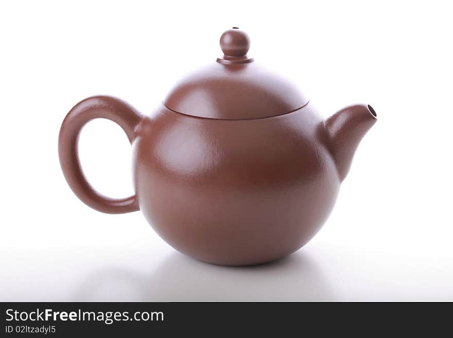 Chinese handmade teapot isolated on white background.