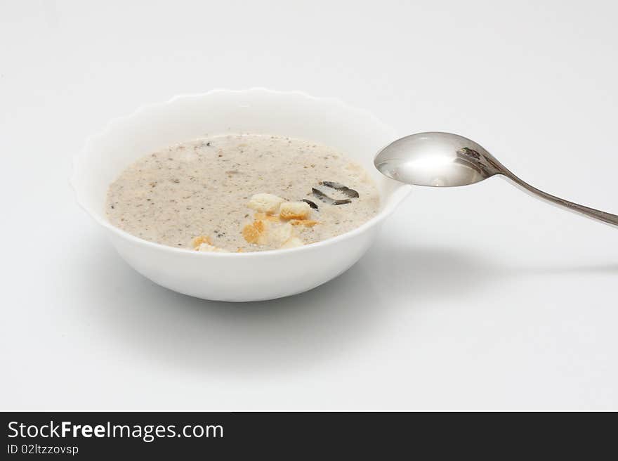 Homemade creamy mushrooms soup with thyme