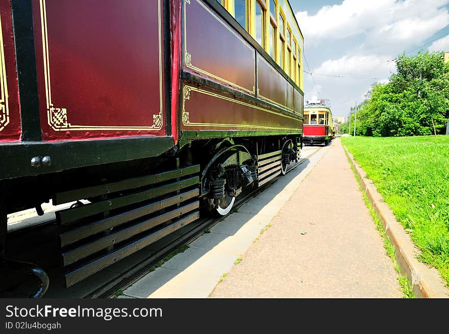 The old tram on city streets. The old tram on city streets