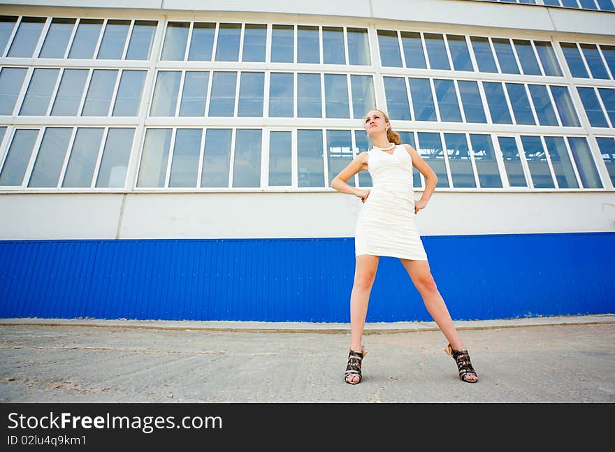 Girl Posing Over Factory