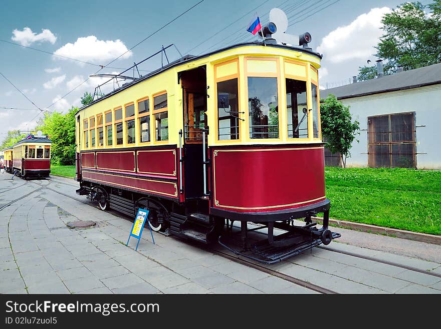 The old tram on city streets. The old tram on city streets