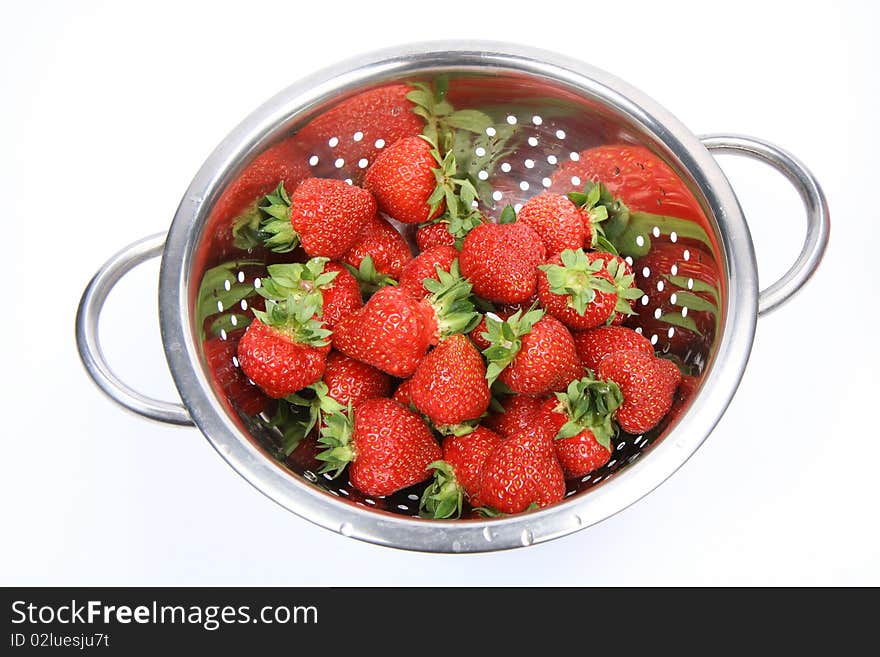 Washed strawberries in a colander