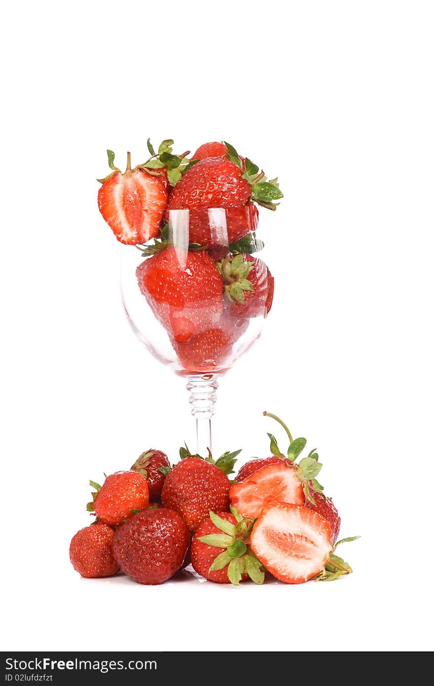 Glass full of strawberry on white background