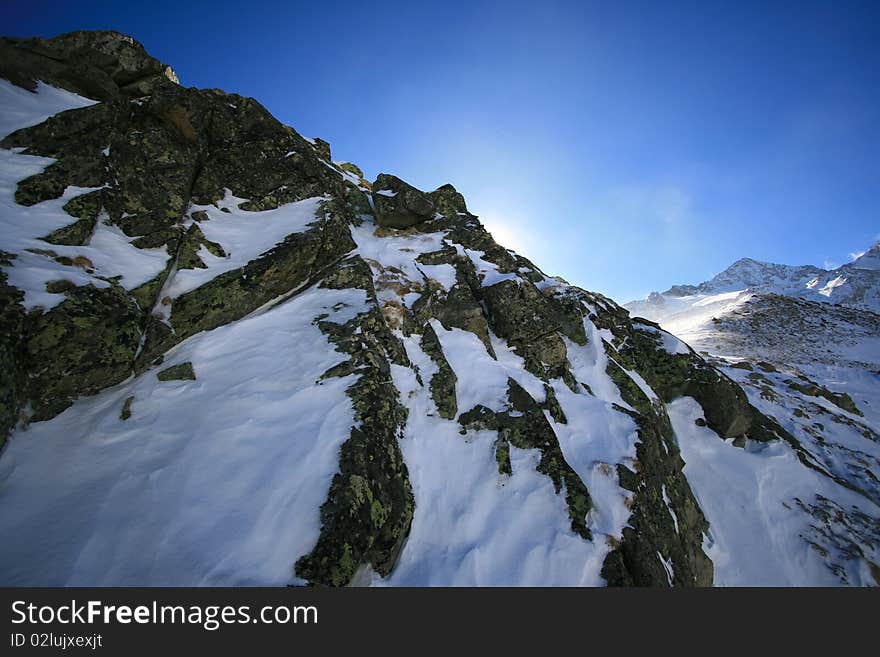 Rock and snow in Switzerland Alps