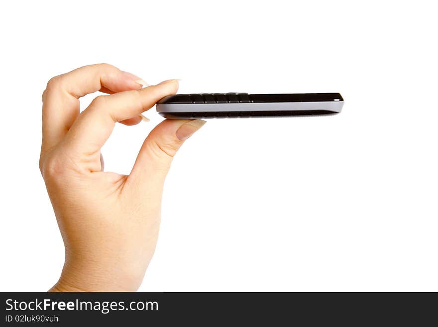 Slim mobile phone in the women's hand isolated on white background