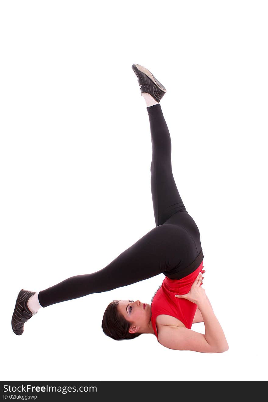 Pretty young girl in the gymnastic pose