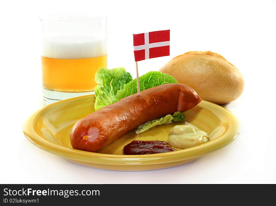 Danish sausage with bread on a plate