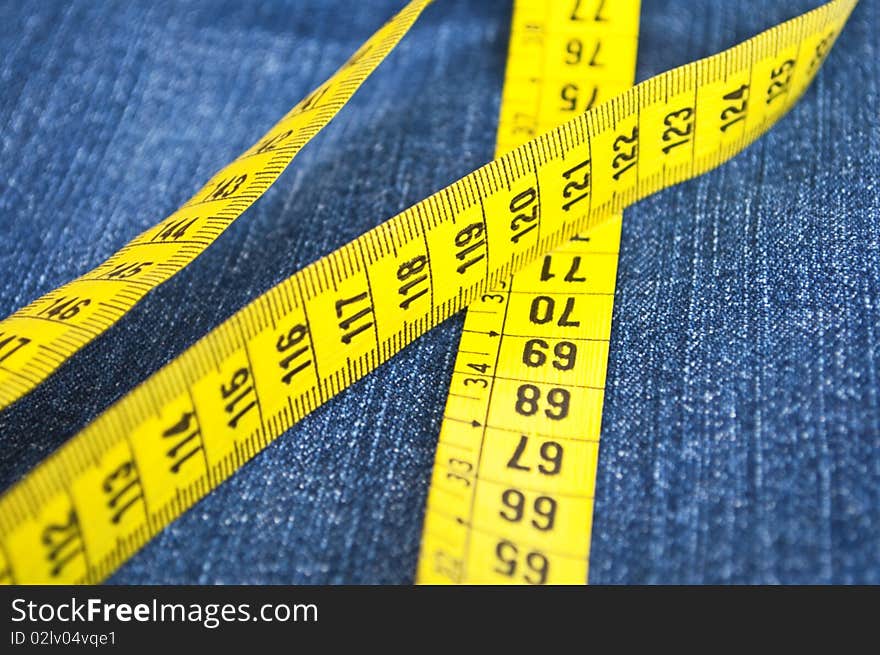 Blue jeans and measure tape