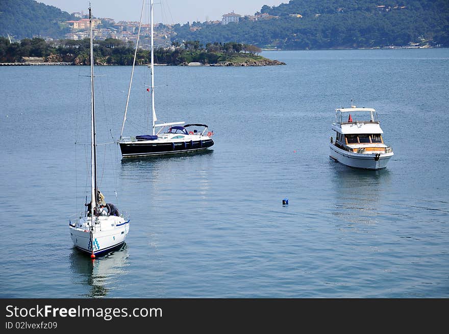 Three luxury boats traveling on sea . Three luxury boats traveling on sea