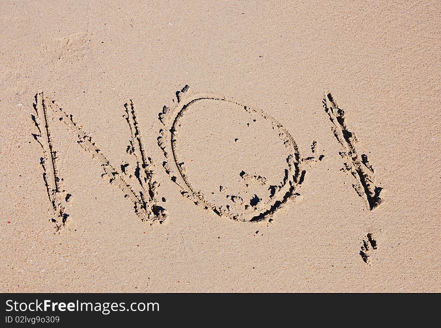 Word written on the golden sand at the beach. Word written on the golden sand at the beach