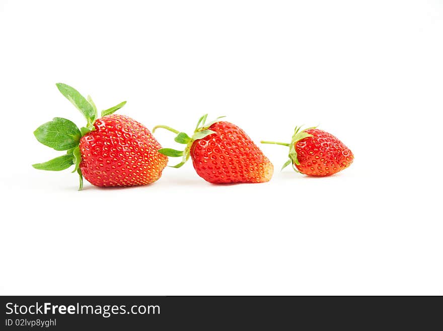 A three strawberry on white