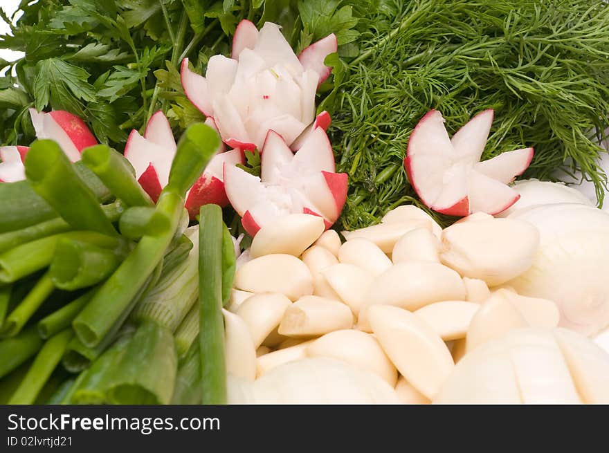 Salad vitamin from green onions of a garden radish and garlic