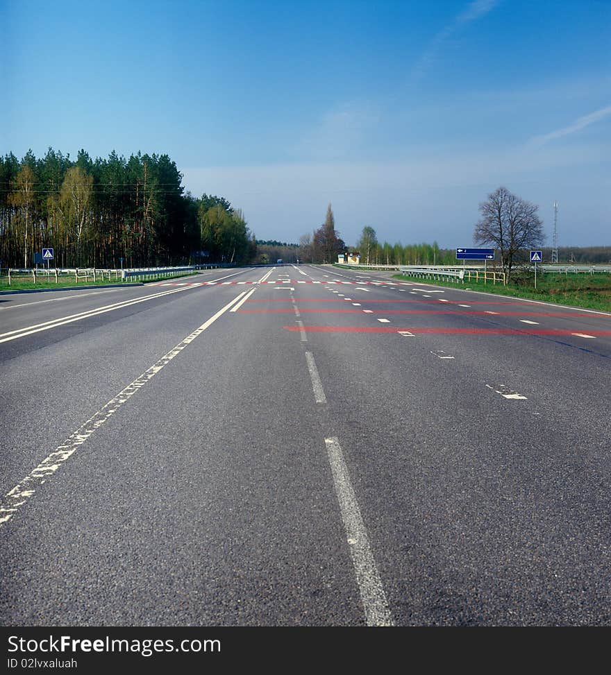 Highway among green woods and fields. Ukraine. Highway among green woods and fields. Ukraine.