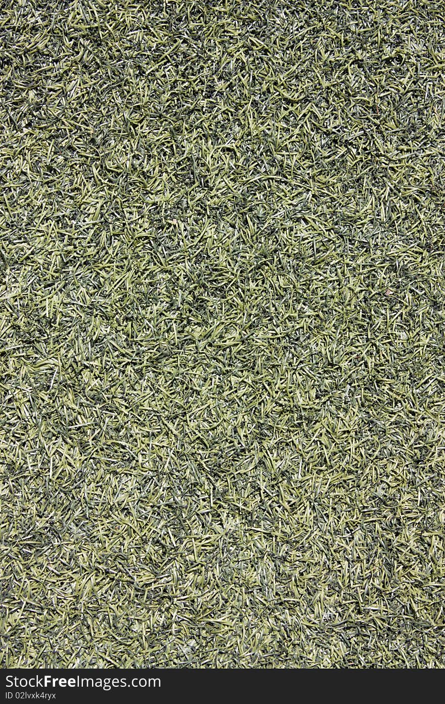 A green color grass carpet. A green color grass carpet