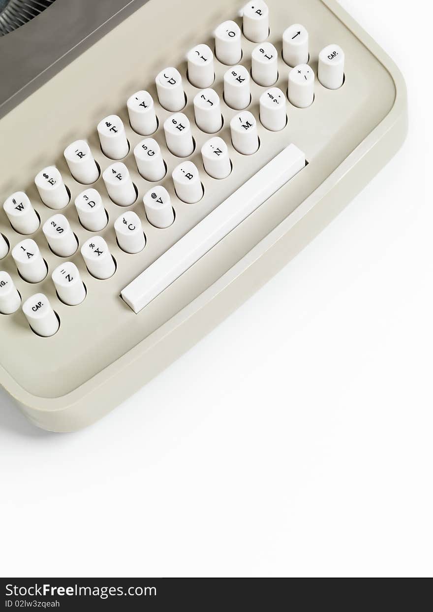 Closeup of a retro typewriter keyboard isolated on white background